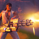 Ryu shooting a giant minigun. (Screenshot used with permission.)